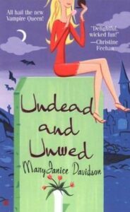 Book cover for "Undead and Unwed" by MaryJanice Davidson, featuring a cartoon blonde woman in a red dress sitting on a bright green tombstone under a crescent moon. Vampire romance book collection