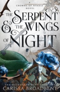Book cover for "The Serpent and the Wings of Night" by Carissa Broadbent, featuring a large green serpent scale texture, blue crystalline roses, a sword, and stylized dark figures at the bottom.